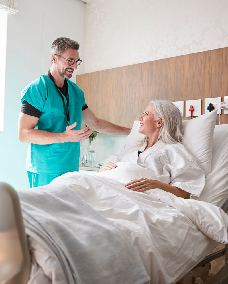 Surgeon talking to patient